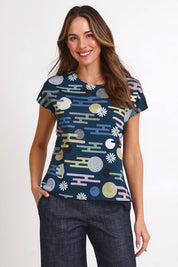Model Madelinec wearing size 10 of the Tilly Top - Cloudblue in colour Cloudblue, in a cropped view