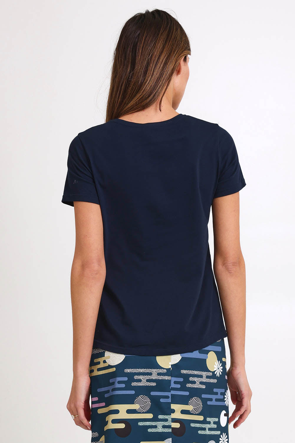 Model Madelinec wearing size 10 of the Girlfriend Tee - Navy in colour Navy, from the back
