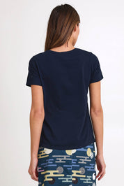 Model Madelinec wearing size 10 of the Girlfriend Tee - Navy in colour Navy, from the back