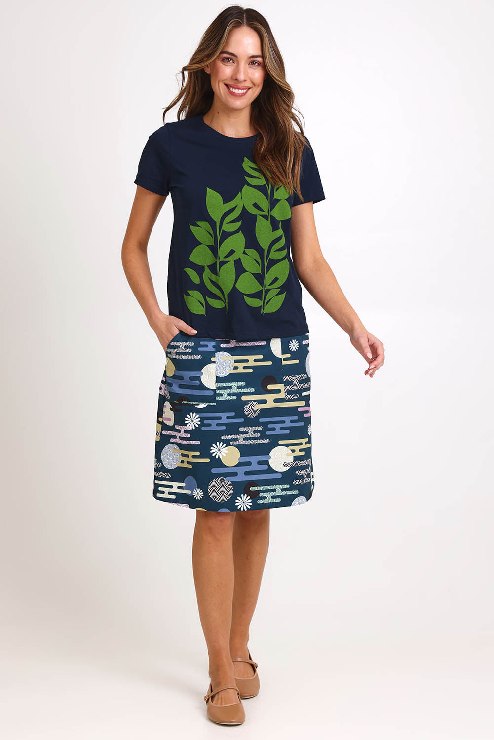 Model Madelinec wearing size 10 of the Girlfriend Tee - Navy in colour Navy, from the front