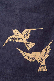 Product shot of the 2 Birds Denim Skirt in colour PuttyDenim (Blue), detail