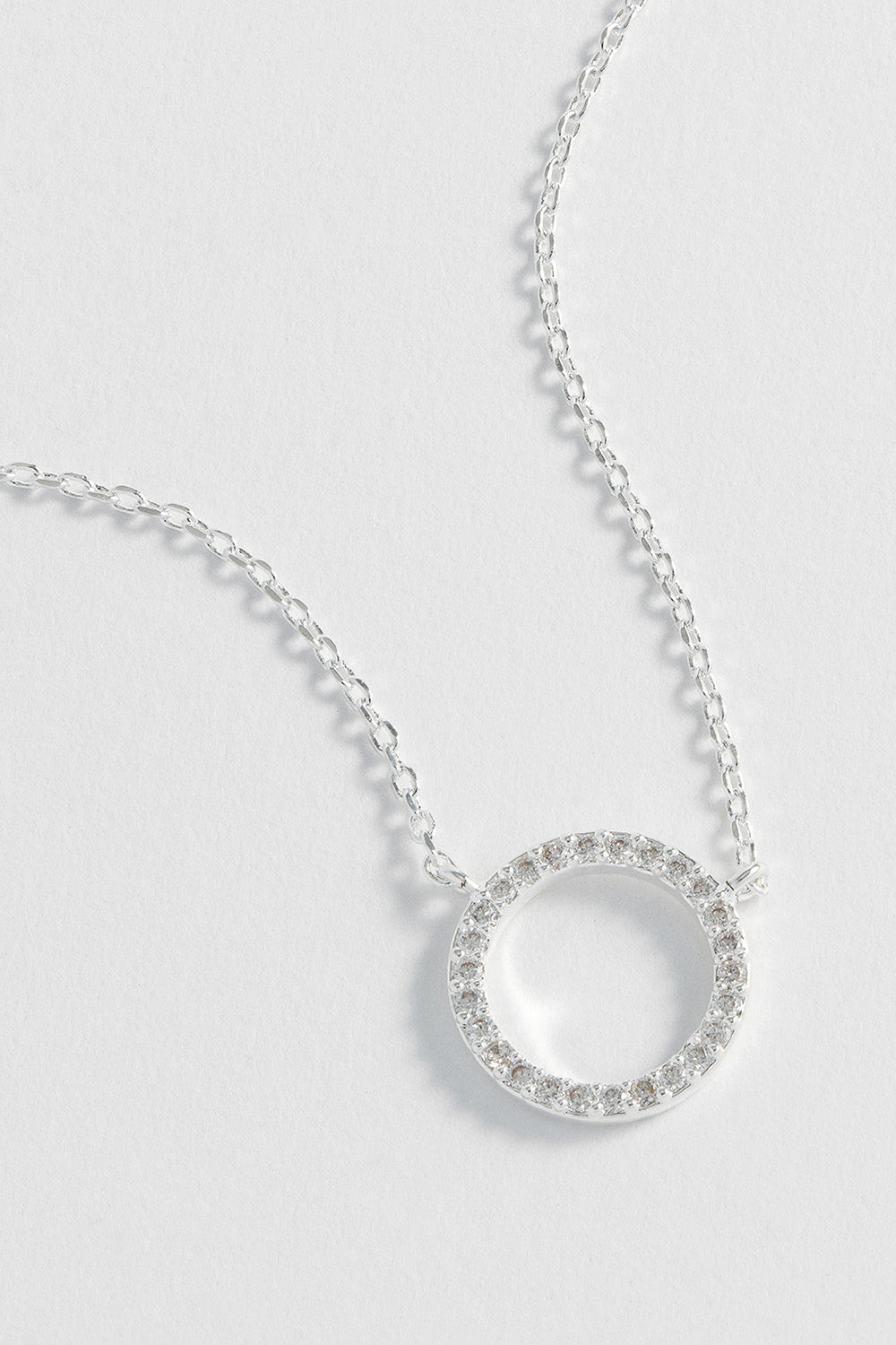 Product shot of the Circle Pave Necklace in colour Silver (Metallics), detail