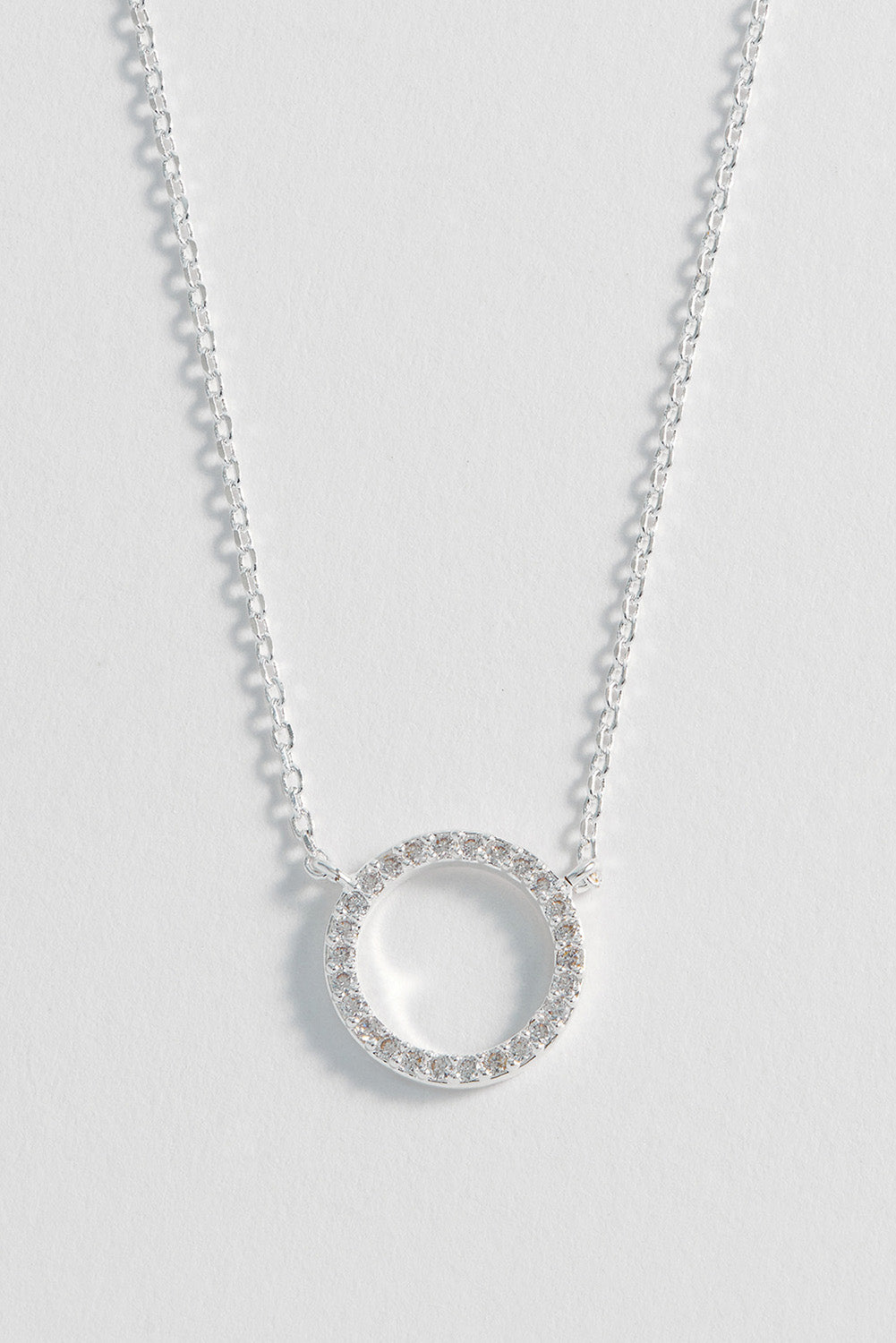 Product shot of the Circle Pave Necklace in colour Silver (Metallics), detail