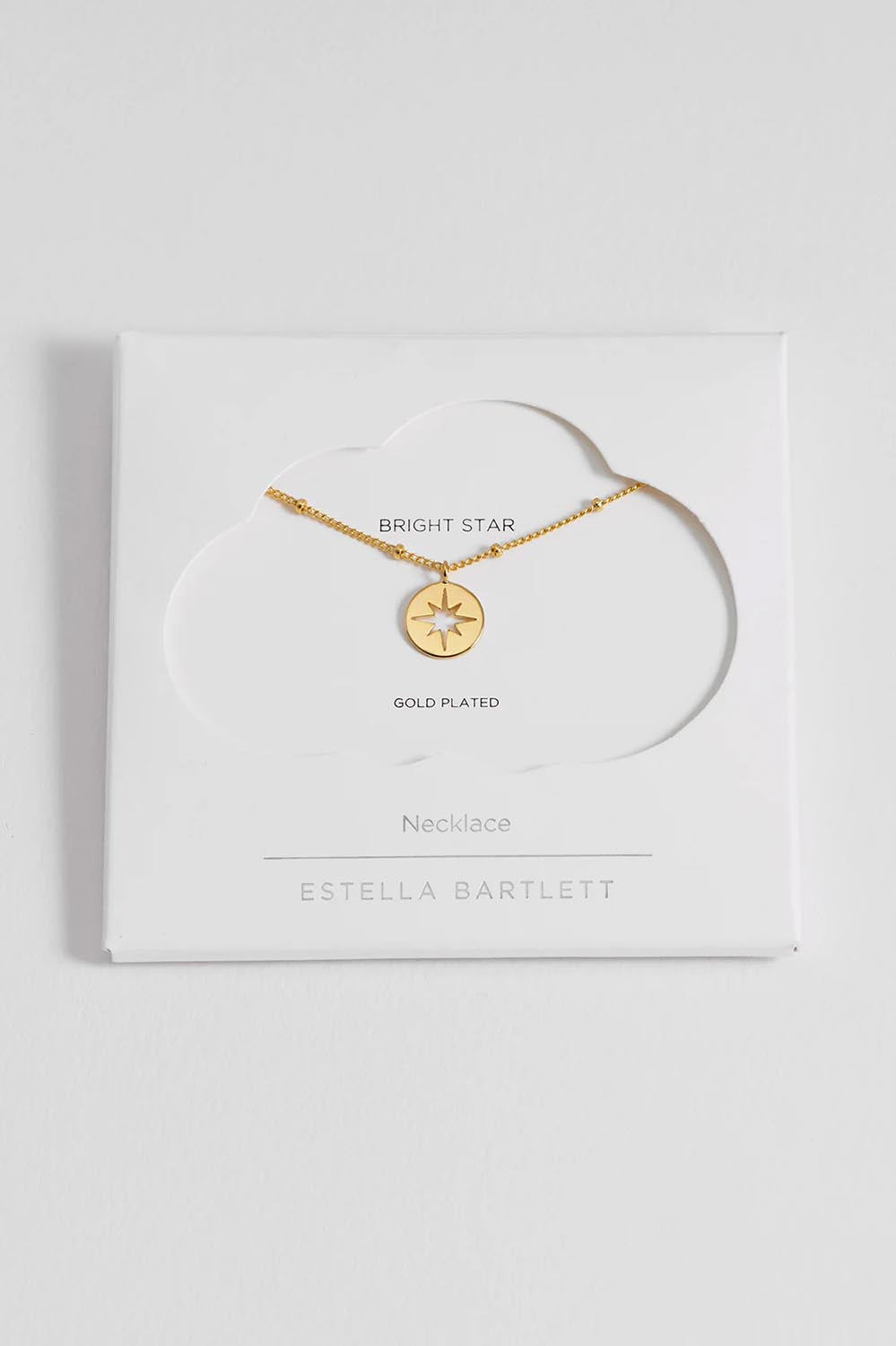 Product shot of the Starburst Disc Necklace in colour Gold (Metallics), from the front