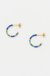 Product shot of the Night Sky Beaded Hoop Earring in colour Bluegold (Blue), detail