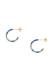 Product shot of the Night Sky Beaded Hoop Earring in colour Bluegold (Blue), from the front