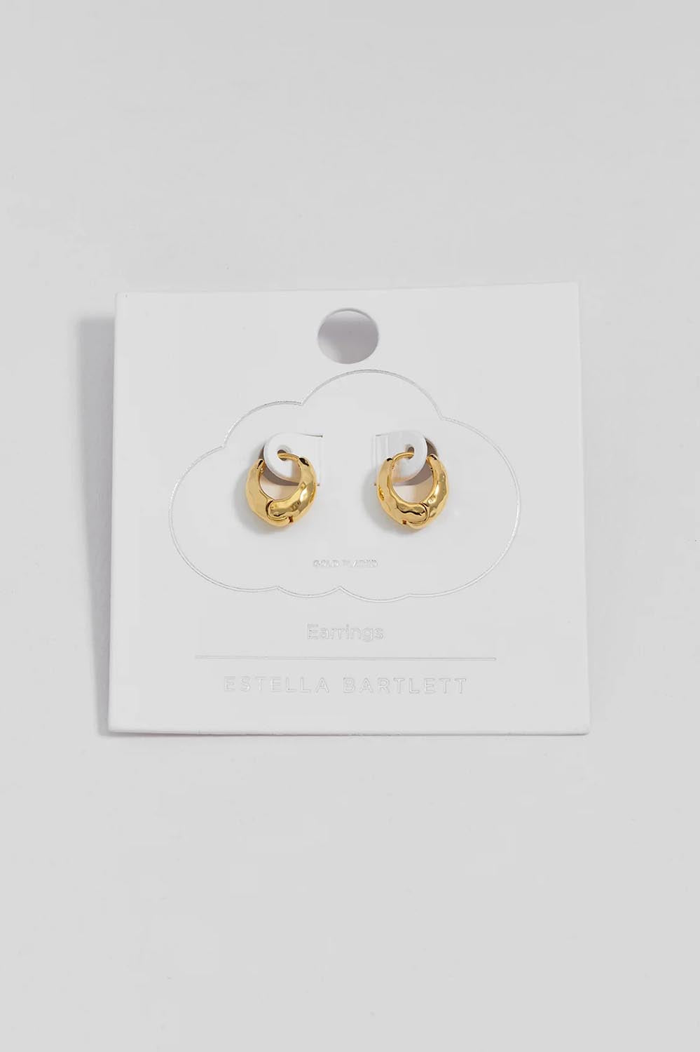 Product shot of the Hammered Huggie Hoops – Gold in colour Gold, from the front