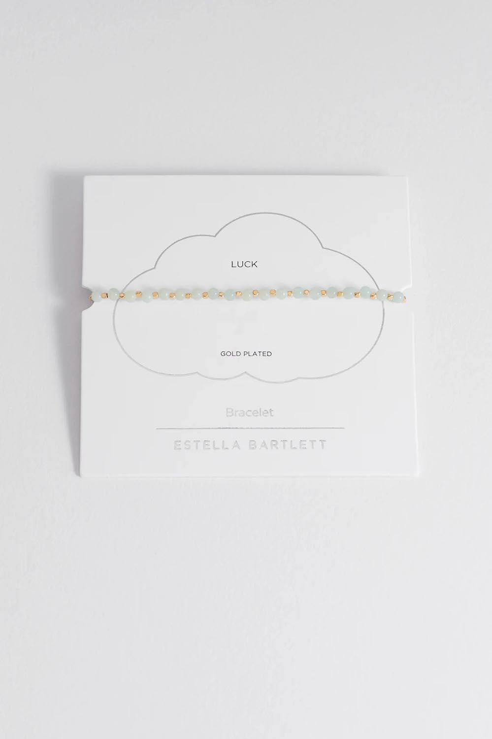 A model wearing the Amelia Amazonite Bracelet in colour Amazonite (Green), from the front, showing the whole outfit