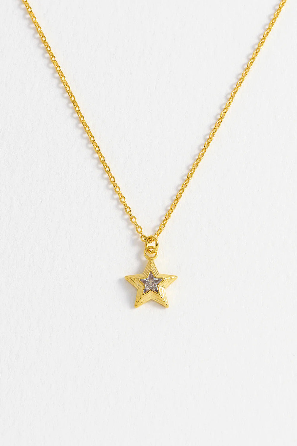 Product shot of the Blue Star Necklace in colour Gold (Metallics), detail