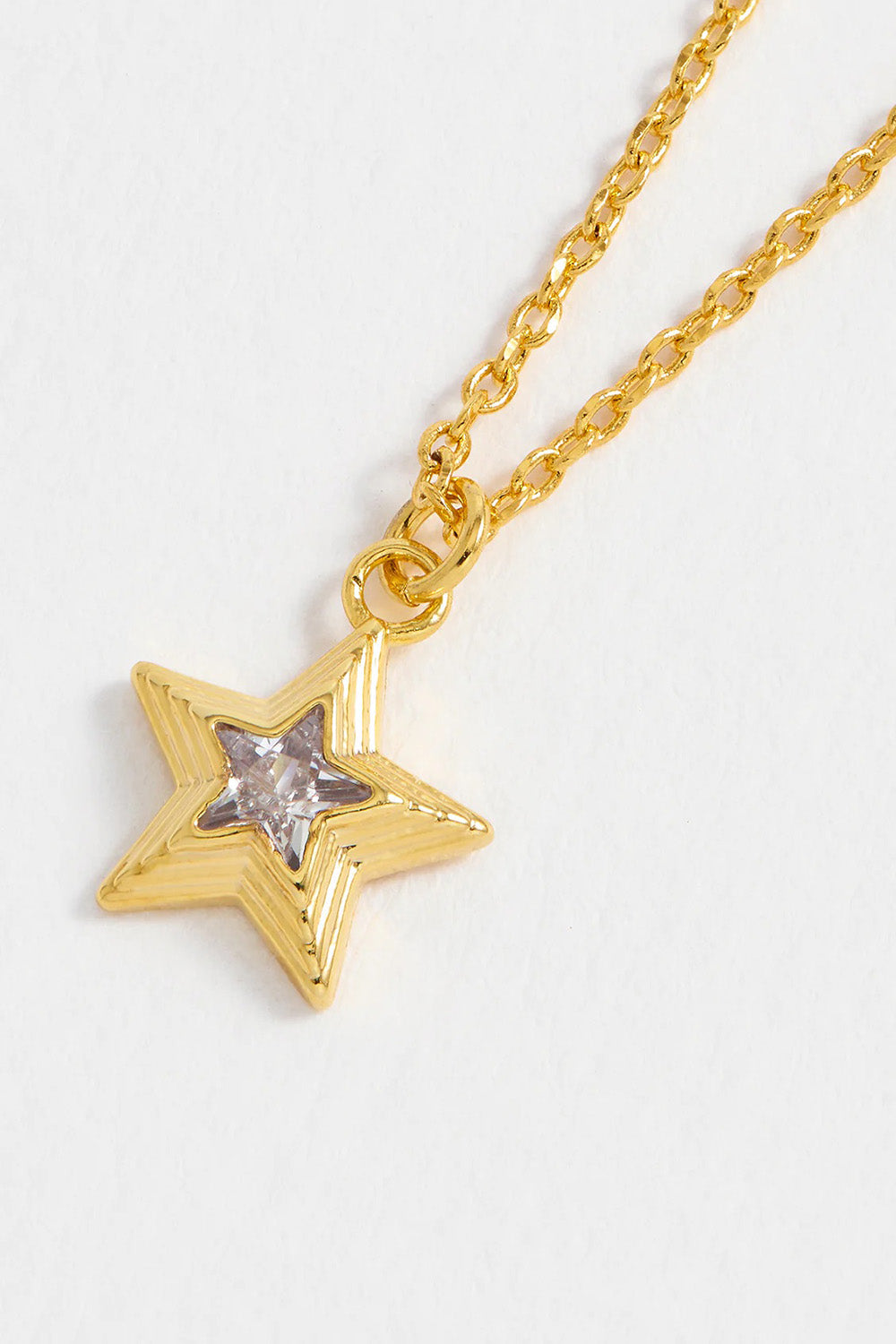 Product shot of the Blue Star Necklace in colour Gold (Metallics), detail