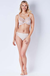 Model Phoebe wearing size S of the Coral High Cut Brief in colour Latte, from the front, showing the whole outfit