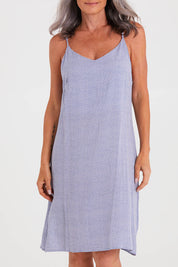 Model Luisa wearing the Basketweave Short Chemise in colour Dusk (Blue), from the front, cropped image