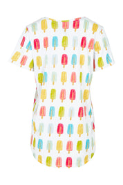 Product shot of the Here Comes The Summer Cotton Tee in colour Icy, from the back