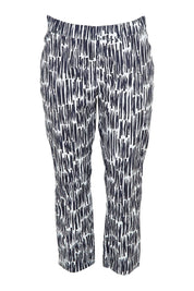 Product shot of the Fuss Free Cotton Blend Taper Capri Trapeze Pant in colour Code (Black), from the front