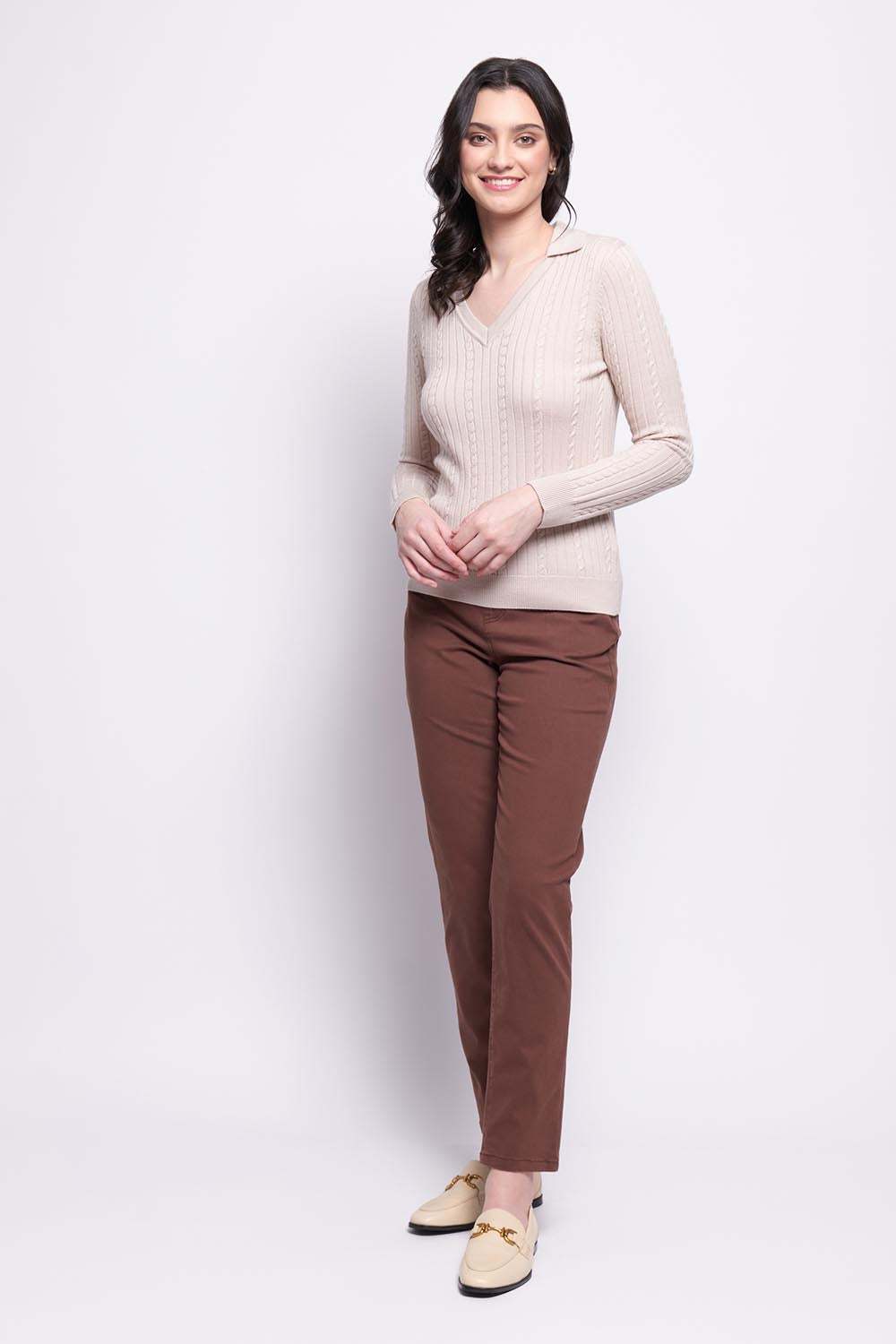 A model wearing the Holey Moleskin Trouser in colour Sepia, from the front, showing the whole outfit