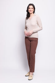 A model wearing the Holey Moleskin Trouser in colour Sepia, from the front, showing the whole outfit