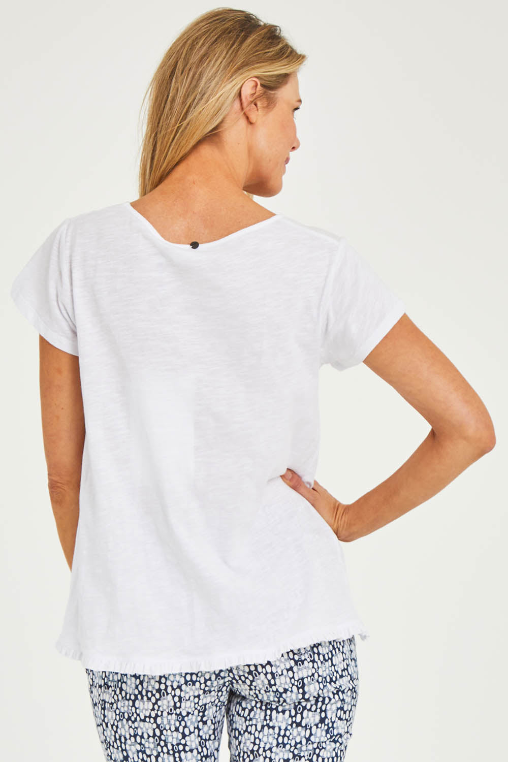Model Kelly wearing size S of the Frill Seeker Cotton Slub Tee in colour White (White), from the back