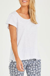 Model Kelly wearing size S of the Frill Seeker Cotton Slub Tee in colour White (White), from the front, cropped image