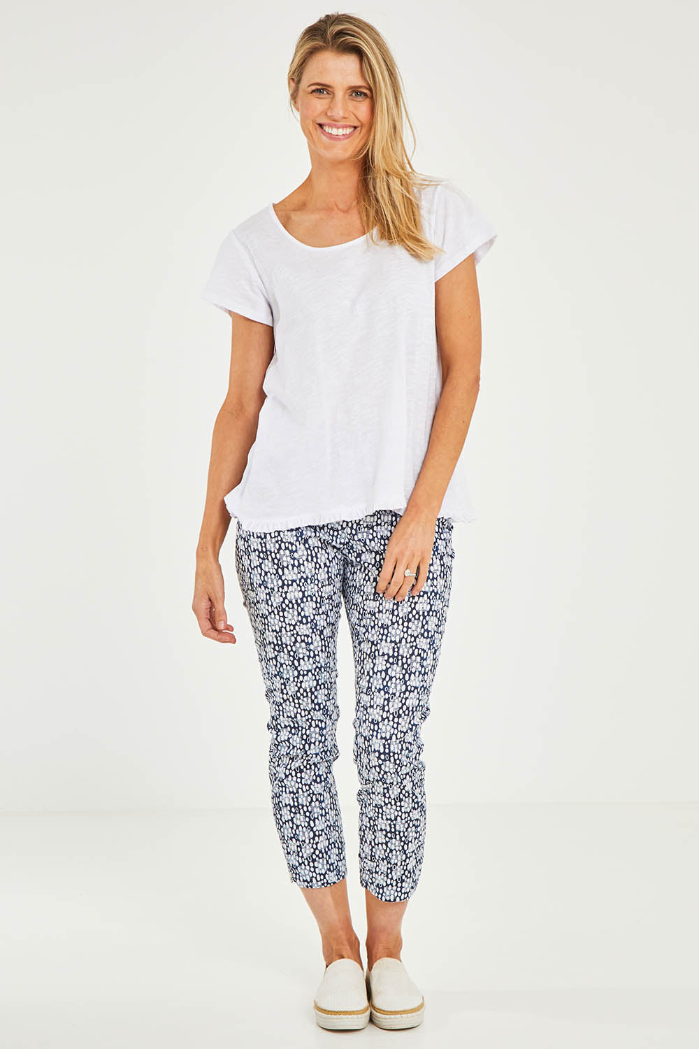 Model Kelly wearing size S of the Frill Seeker Cotton Slub Tee in colour White (White), from the front, showing the whole outfit