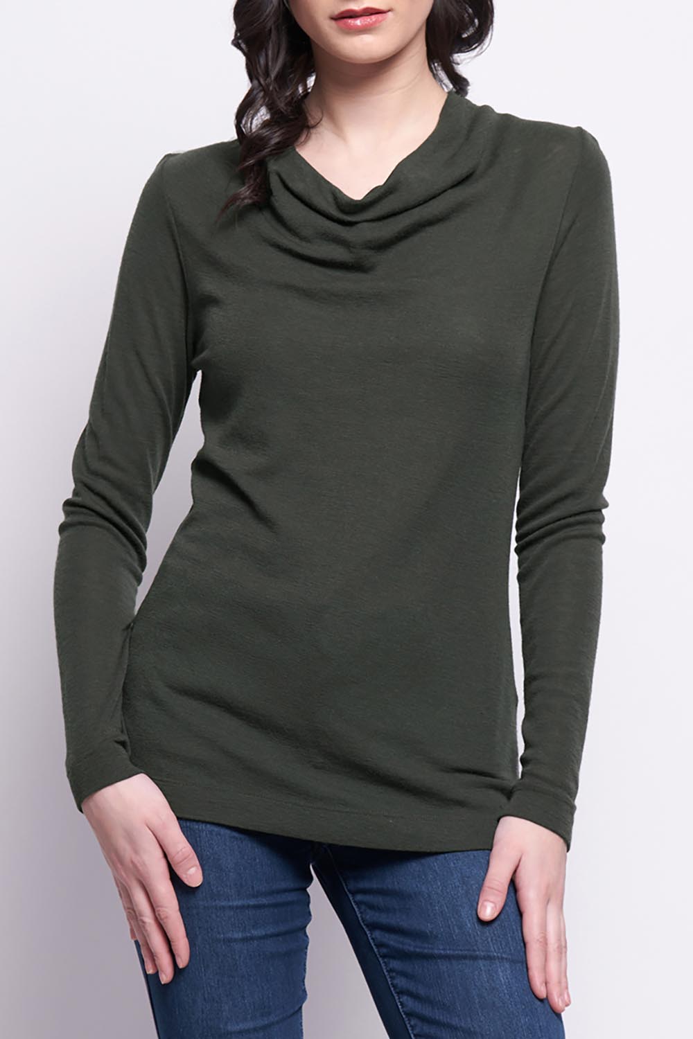 A model wearing the Holy Cowl Wool Top in colour Moss (Green), from the front, cropped image