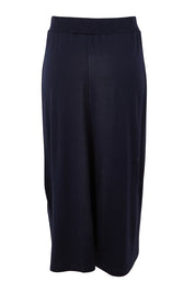 Product shot of the A Game Merino Skirt in colour Futuredusk (Blue), from the back