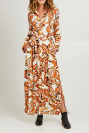 Model Emma wearing size 10 of the Centre Stage Dress in colour Boho, from the front, cropped image