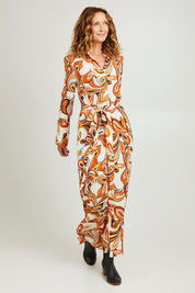 Model Emma wearing size 10 of the Centre Stage Dress in colour Boho, from the front, showing the whole outfit