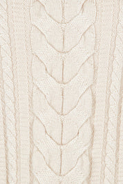 Product shot of the Merino Plot Twist Vest in colour Pearl, detail