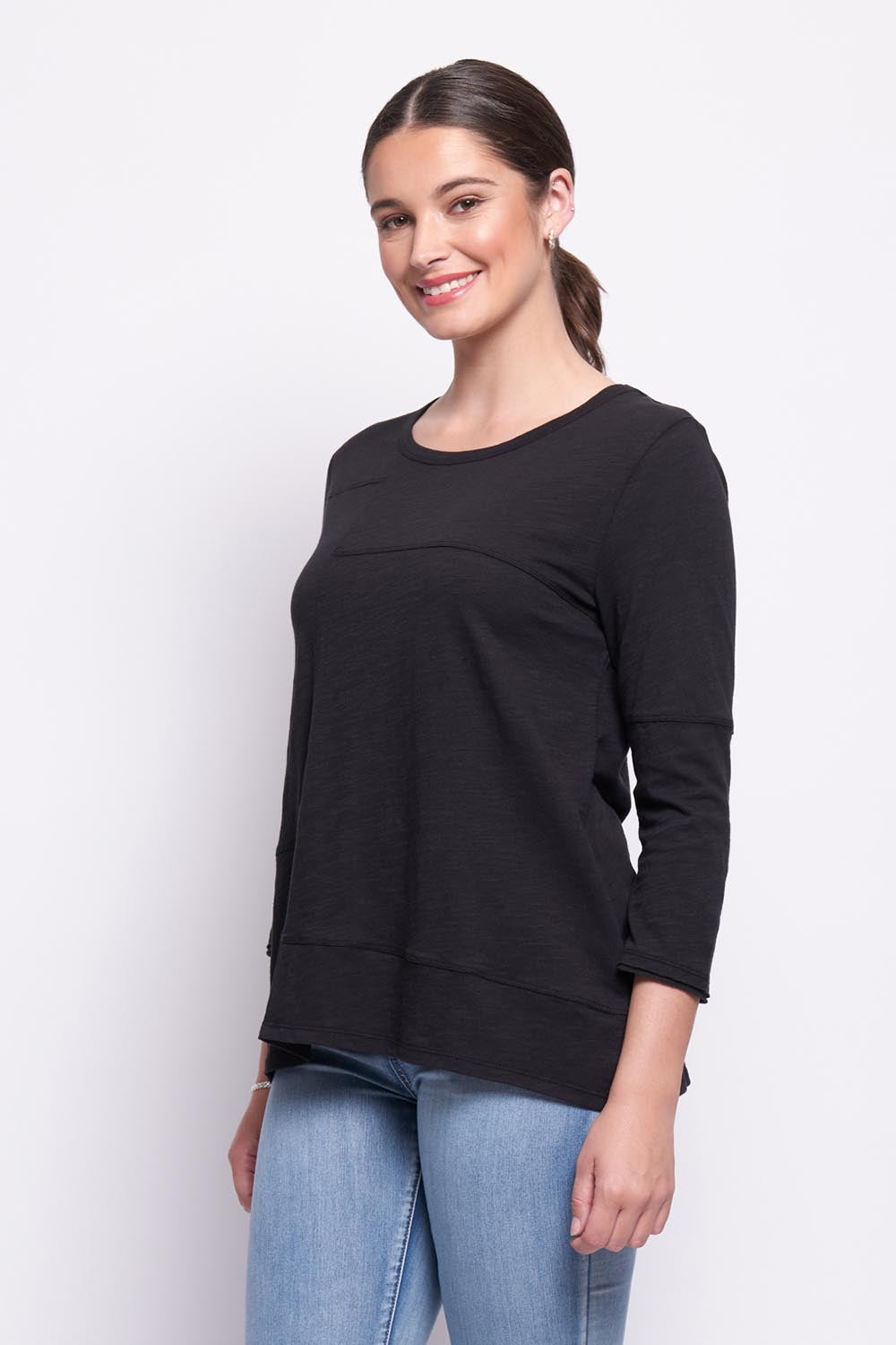 A model wearing the Sew It Seams Cotton Top in colour Black (Black), from the front, cropped image