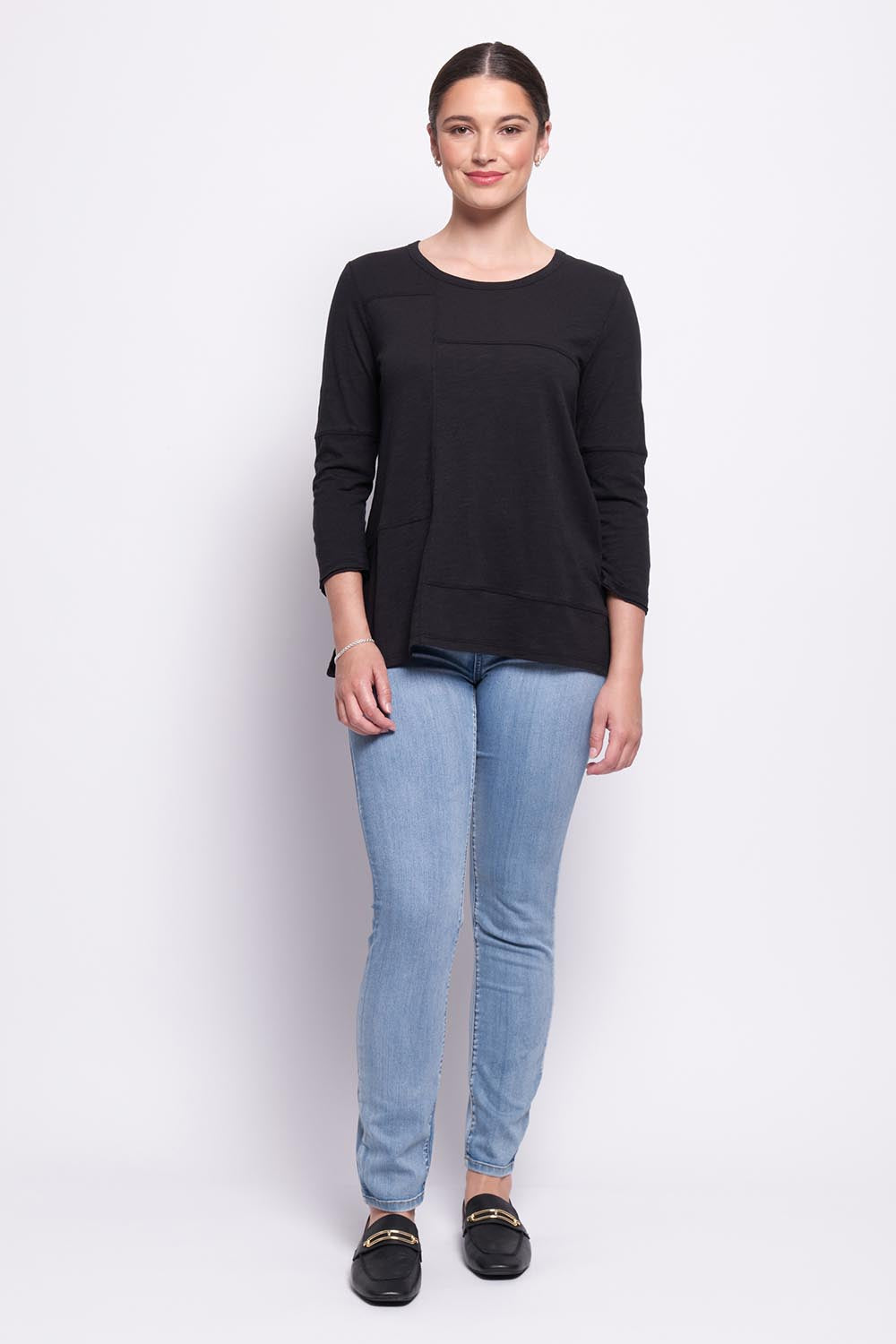 A model wearing the Sew It Seams Cotton Top in colour Black (Black), from the front, showing the whole outfit