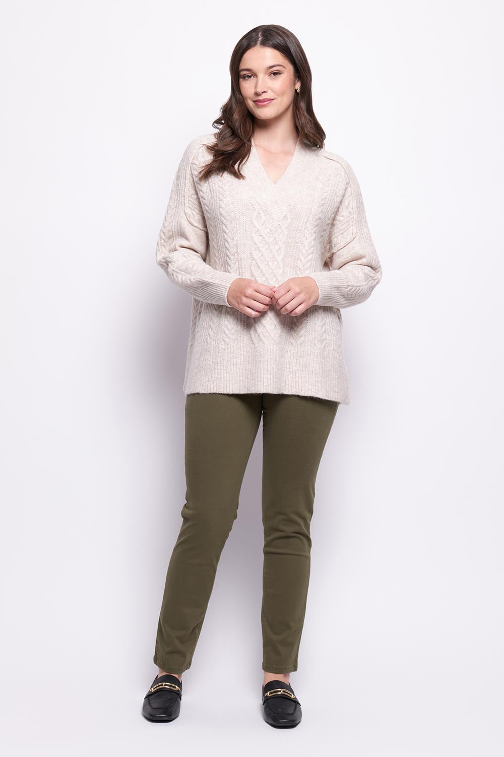 A model wearing the She's A Purla Sweater in colour Natural, from the front, showing the whole outfit