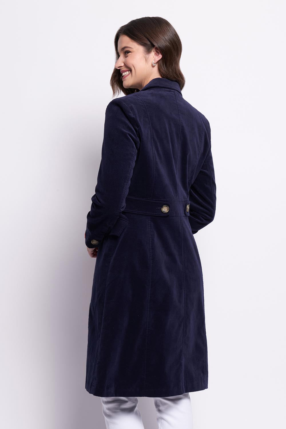 A model wearing the For The Rein colourCord Coat - Midnight (Blue), from the back