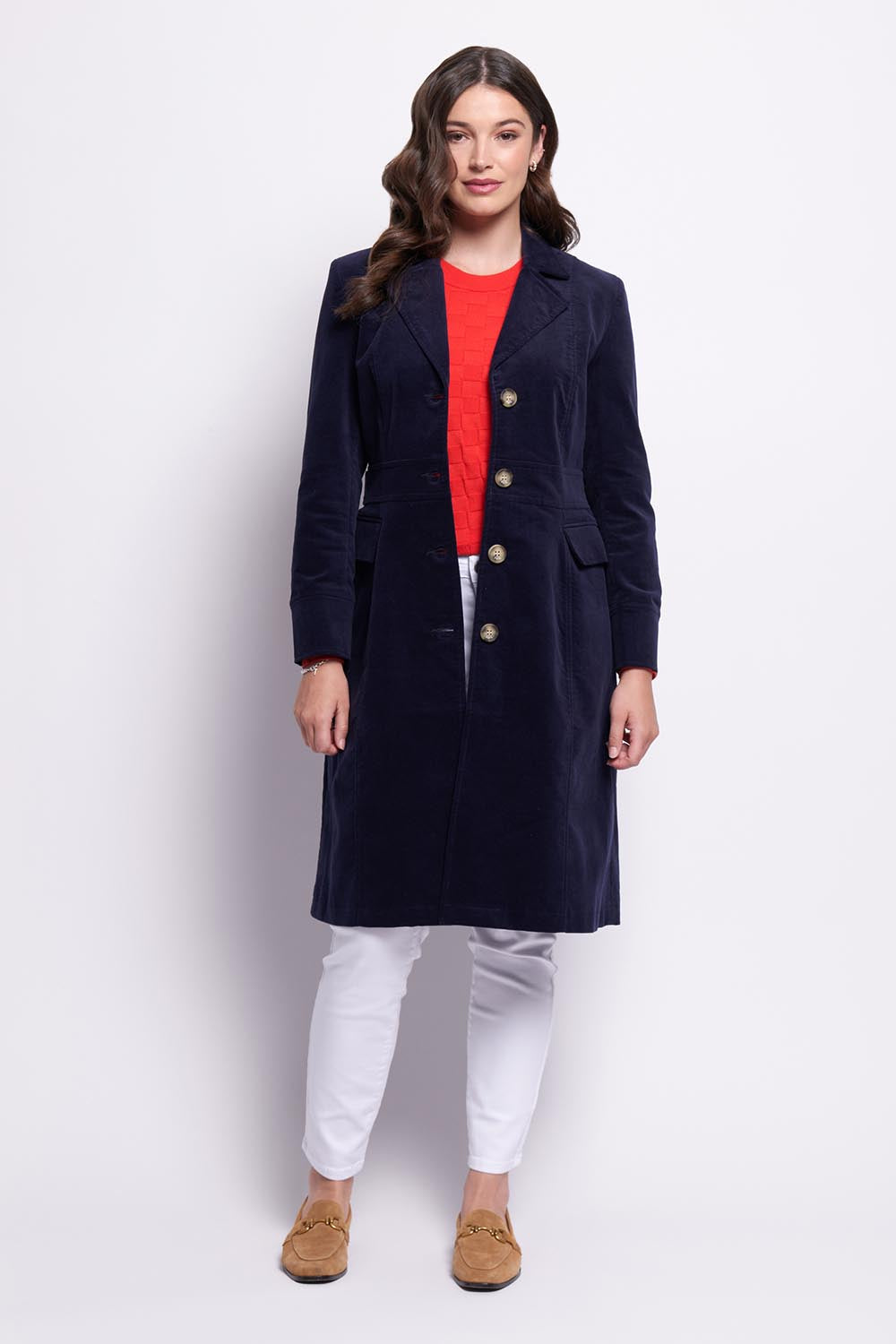 A model wearing the For The Rein colourCord Coat - Midnight (Blue), from the front, showing the whole outfit