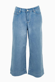 Product shot of the Jean Queen Crop in colour Bluewash (Blue), from the front