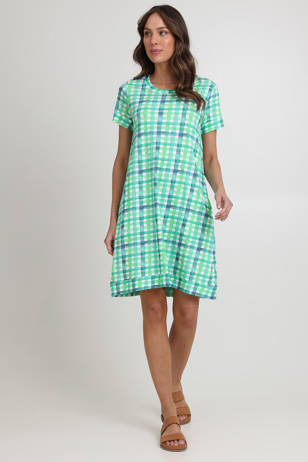 Model Madeline wearing size S of the Oh Frock Cotton Dress in colour Edgy (Green), from the front, showing the whole outfit