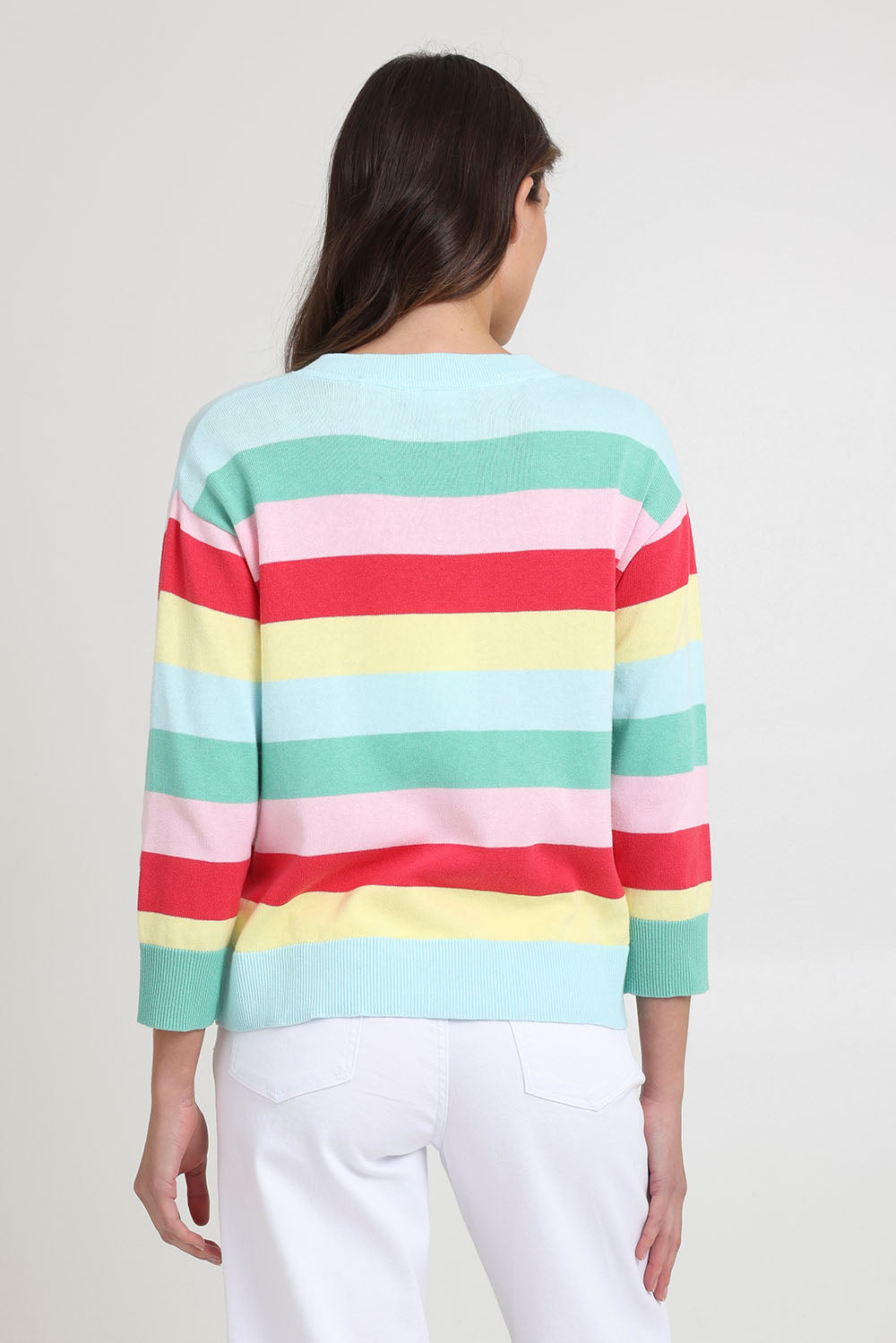 Model Madeline wearing size S of the Blooming Cotton Sweater in colour Rainbowstr, from the back