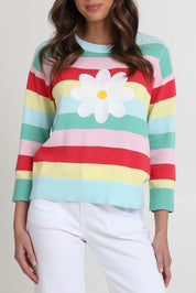 Model Madeline wearing size S of the Blooming Cotton Sweater in colour Rainbowstr, from the front, cropped image