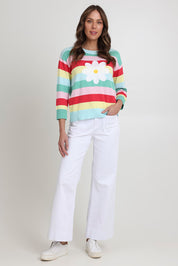 Model Madeline wearing size S of the Blooming Cotton Sweater in colour Rainbowstr, from the front, showing the whole outfit