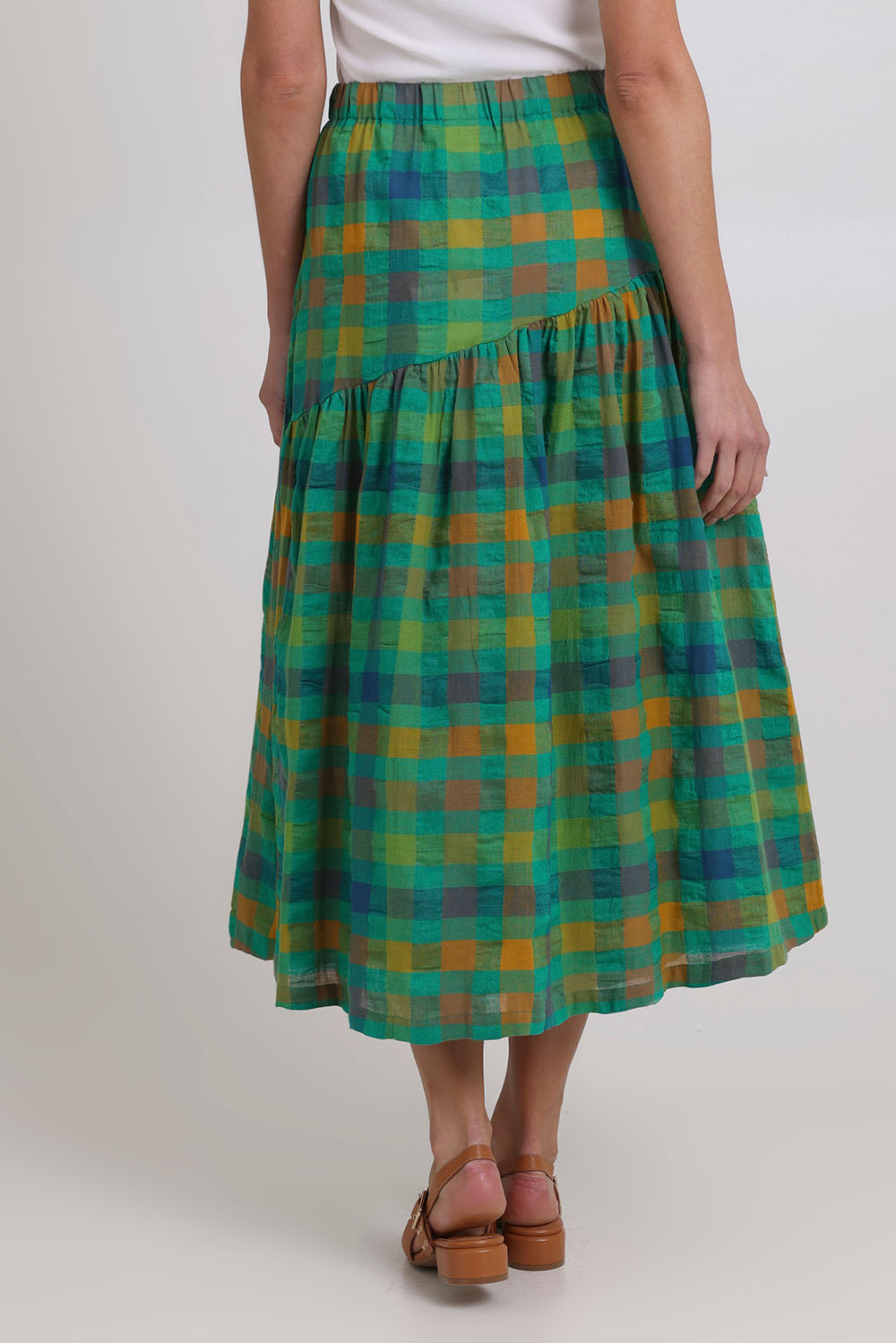 Model Madeline wearing size 10 of the Checkmate Cotton Linen Skirt in colour Greencheck (Green), from the back