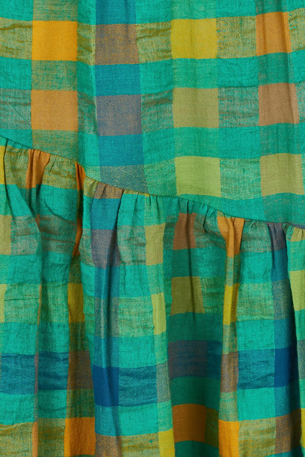 Product shot of the Checkmate Cotton Linen Skirt in colour Greencheck (Green), detail