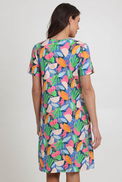 Model Madeline wearing size S of the Here Comes The Summer Cotton Dress in colour Distract, from the back