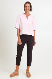 Model Riinar wearing size 10 of the Fuss Free 7/8 Pant – Sable in colour Sable, from the front
