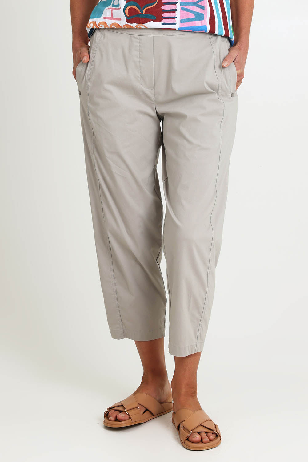 Model Riinar wearing size 10 of the Pump It Up Pant – Barley in colour Barley, in a cropped view