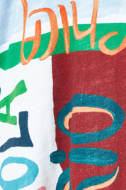 Product shot of the Role Model Tee – Chica in colour Chica, showing detail