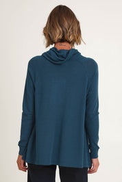 Model Riina wearing size S of the Good Stakes Top in colour Green (Green), from the back