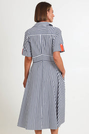 Model Riinar wearing size 10 of the On Point Dress – Navytang in colour Navytang, from the back