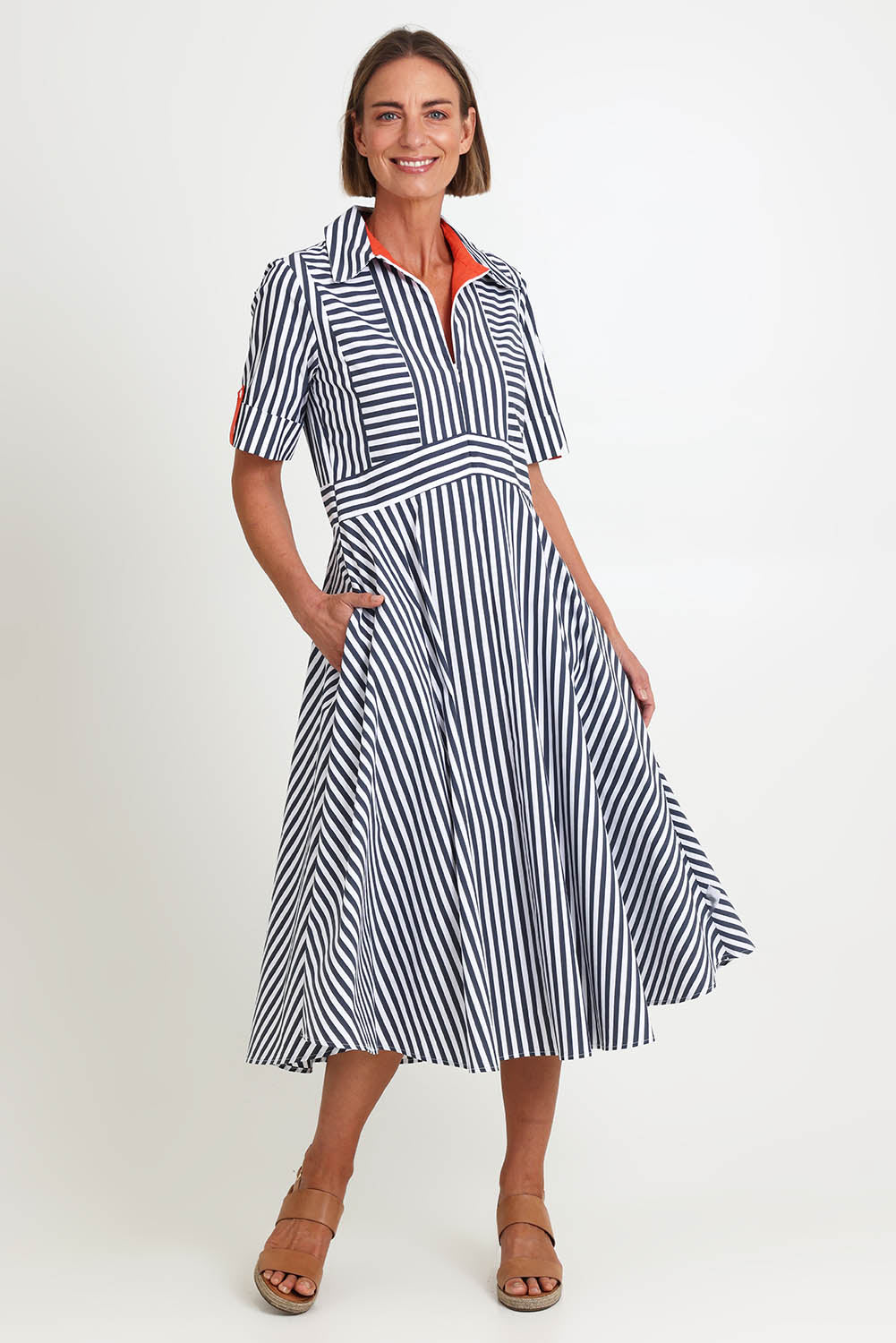 Model Riinar wearing size 10 of the On Point Dress – Navytang in colour Navytang, from the front