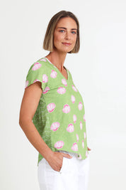 Model Riinar wearing size 10 of the Ever So Fine Tee – Keepclam in colour Keepclam, from an angle