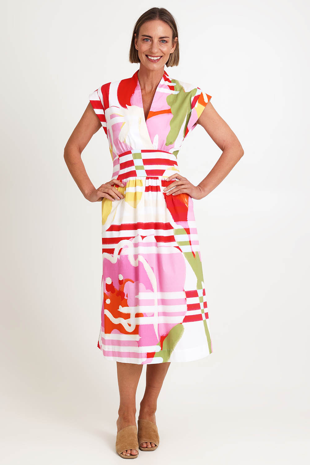 Model Riinar wearing size 10 of the Gifted Dress – Podium in colour Podium, from the front