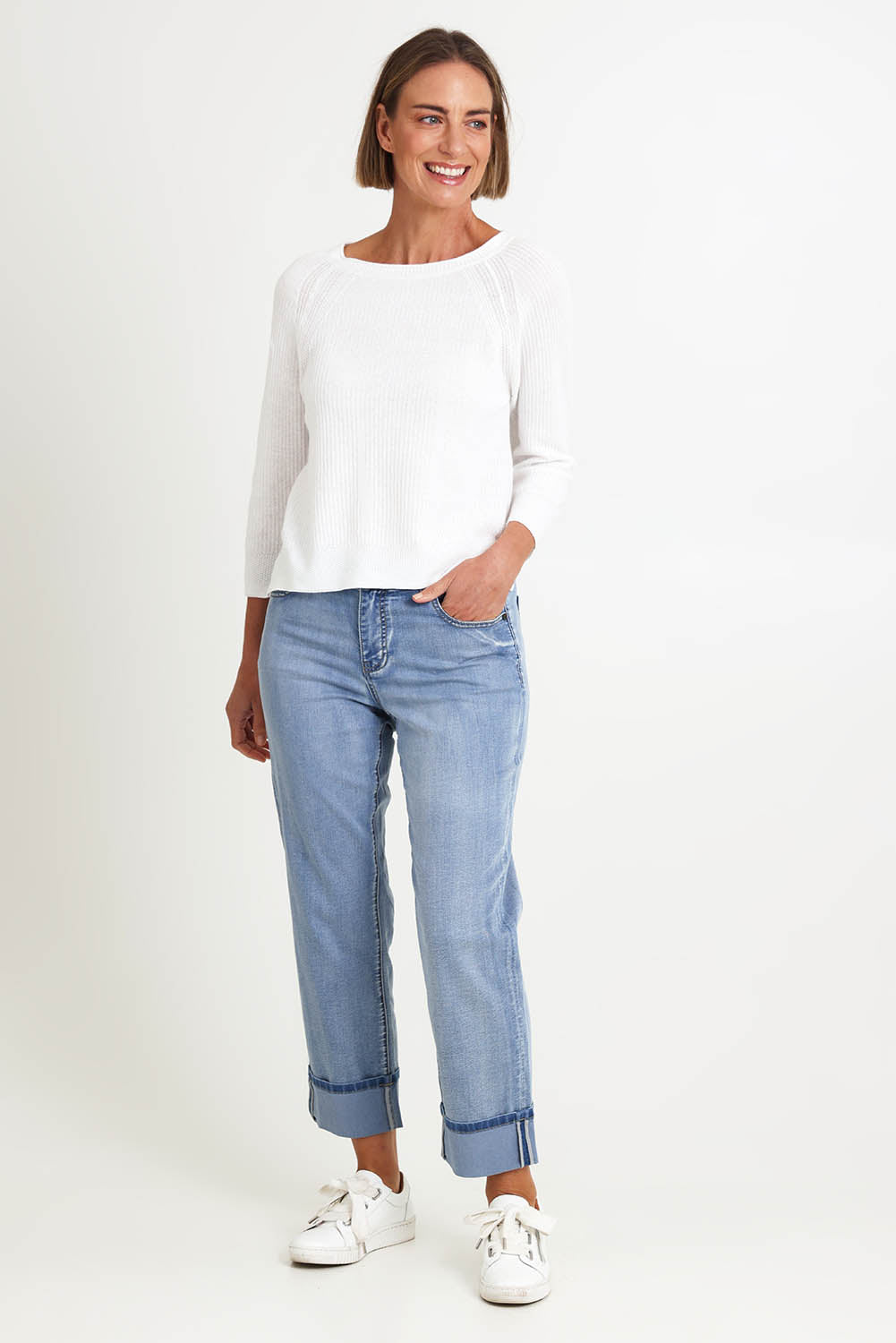 Model Riinar wearing size 10 of the Loop Me In Sweater – Vanilla in colour Vanilla, from the front